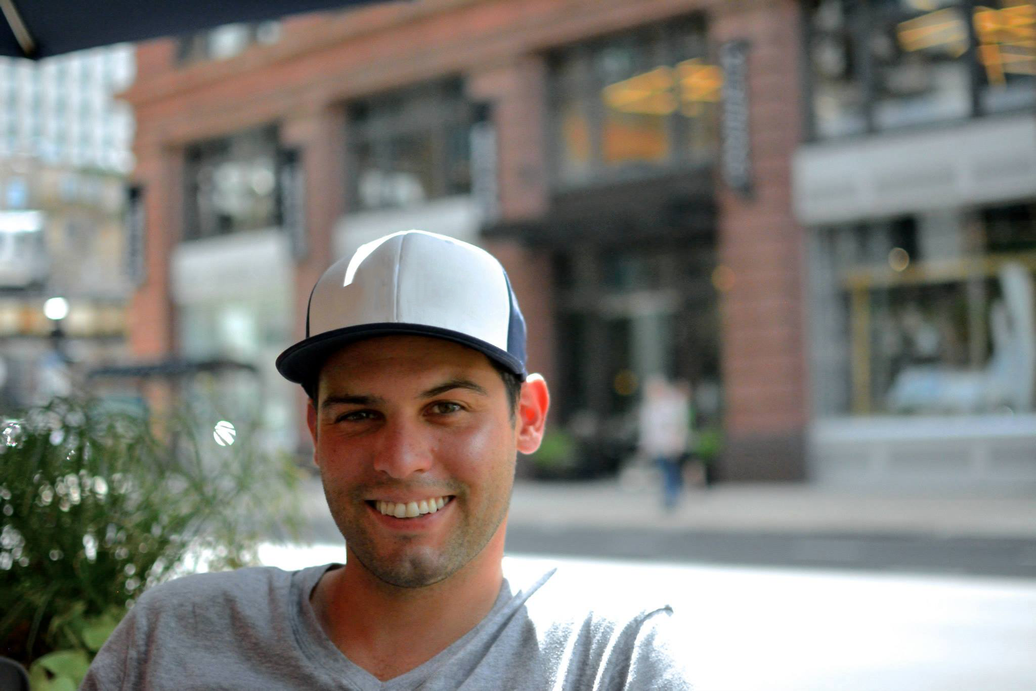 Headshot with hat.png